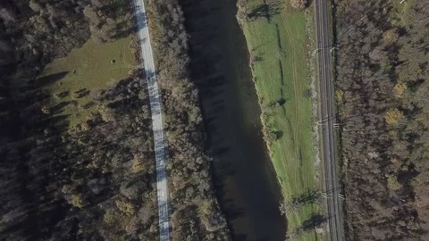 Flight over the river, road and the railway Stock Footage 81004018