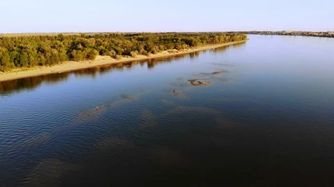 Flight over the river, strange islands, beach and forest. Stock Footage 130115081