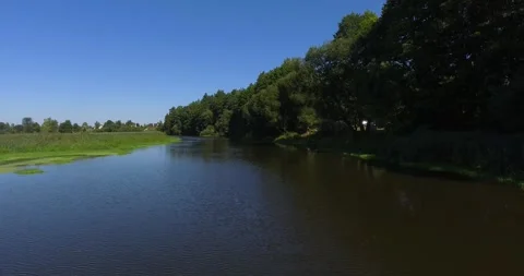 Flight over the river in summer Stock Footage 265858874