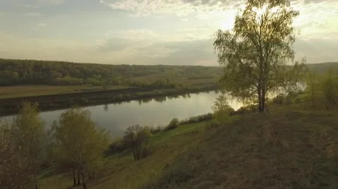 Flight over the river in a sunset Stock Footage 69068706