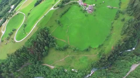 Flight over a river valley in the alps, aerial view from the mountain Stock Footage 57661468