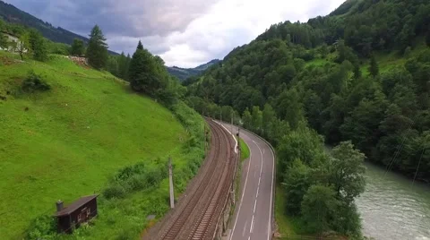 Flight over a river valley in the alps, aerial view from the mountain Stock Footage 57661496