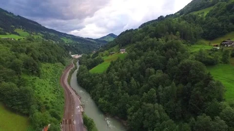 Flight over a river valley in the alps Stock Footage 57661545
