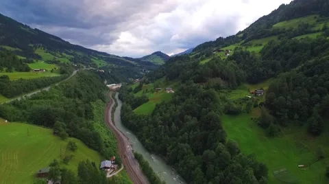 Flight over a river valley in the alps Stock Footage 57661627