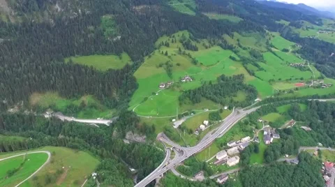 Flight over a river valley in the alps Stock Footage 57662053