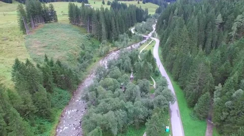 Flight over a river valley in the alps 動画素材 58092809