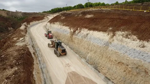 Flight over the road and construction machinery Stock Footage 170932572