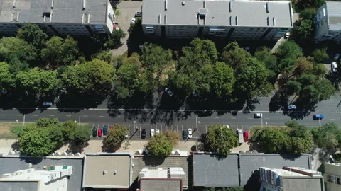 Flight over the road and over the roofs of houses on a summer day Video stock 153338507