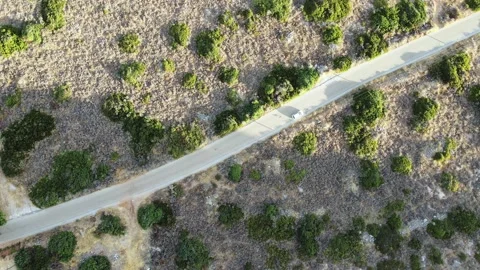 Flight over road in field in greece island Crete. Stock Footage 162354036