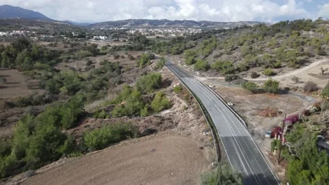 Flight over the road in the mountains. Rural landscapes Stock-Footage 166060959