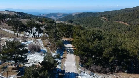 Flight over a road in nature while cars are passing Stock Footage 124434751