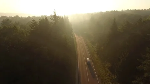 Flight over the road at sunrise. Video stock 80789730