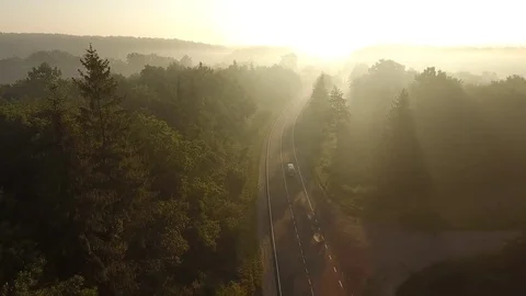 Flight over the road at sunrise. Video stock 80789853