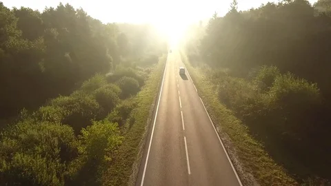 Flight over the road at sunrise. Stock Footage
