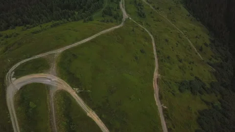 Flight over the road on top of the mountains Video stock 149514246