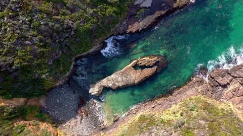 Flight over a rock in Tasmania Stock Footage 262945280