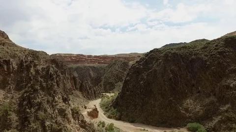 Flight over the rocks in the canyon Charyn. Kazakhstan. Panorama of mountains. Stock Footage 77742664