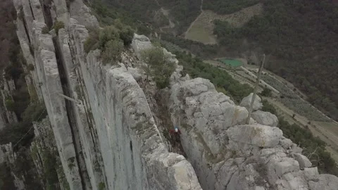 Flight over rocks cross climber 04 Stock Footage 148369228