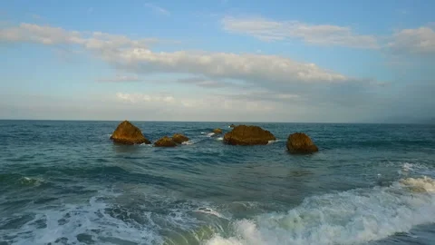 Flight over rocks in the middle of the atlantic ocean Stock Footage 231817834