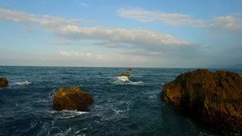 Flight over rocks in the middle of the atlantic ocean Stock Footage 231817850