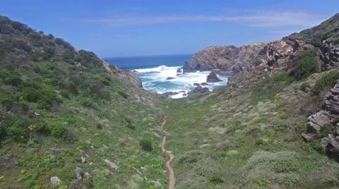 Flight over the rocks on the ocean Stock Footage 64458437