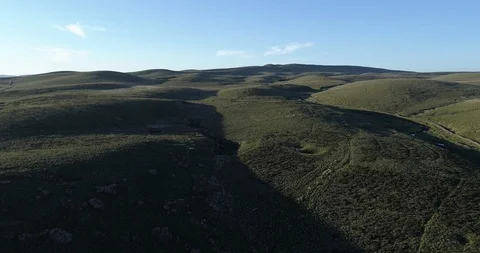 Flight over rolling hills Stock Footage 87011744