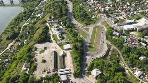 Flight over the roundabout, car traffic, the center of the city of Aleksin Stock Footage 254078114