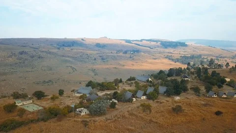 Flight over ruined resort complex on hill top Stock-Footage 78583850
