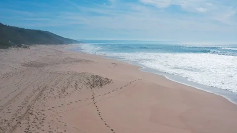 Flight Over the Sandy Beach and Waves Stock Footage 105198062