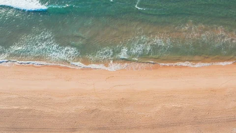 Flight Over the Sandy Beach and Waves Stock Footage 105481032