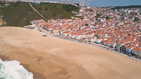 Flight over Sandy Beach near Nazare City Stock Footage 89886599