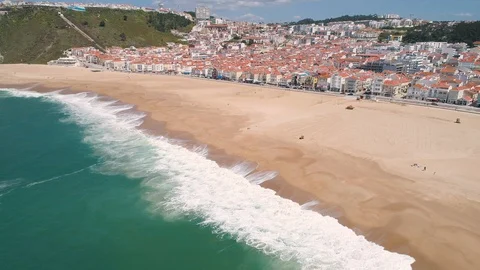 Flight over Sandy Beach near Nazare City Stock Footage 89886721