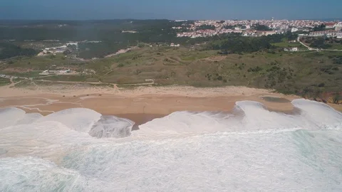 Flight over Sandy Beach near Nazare City Stock Footage 89887153