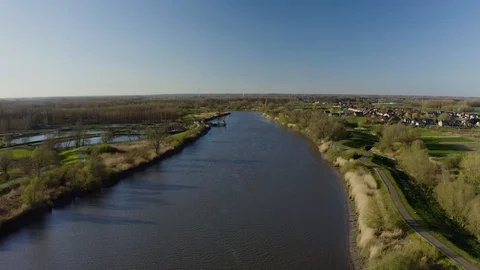 Flight over the Scheldt river, in East Flanders, Belgium Stock Footage 117981992