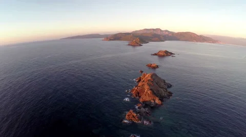 Flight over the sea and islands at sunset, Ajaccio area, Corsica. Aerial view. Vídeo Stock 47464591