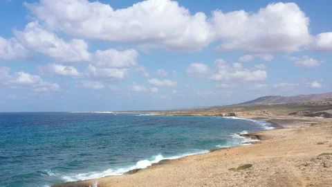 Flight over the sea with beautiful waves and sky Stock Footage 246486389