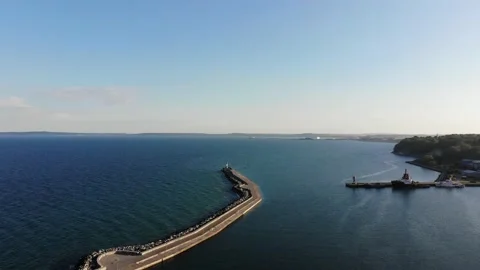 Flight over the sea to the lighthouse. Stock Footage 156515568