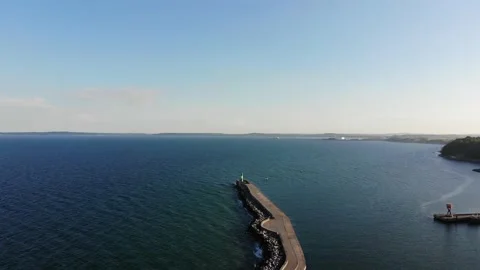 Flight over the sea to the lighthouse. Stock Footage 156515617
