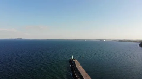 Flight over the sea to the lighthouse. Stock Footage 156515660