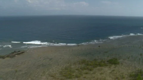 Flight over seaside with rocks and beach Video stock 559232