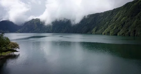 Flight over Sete Cidades in good weather on sao miguel Stock Footage 125607946