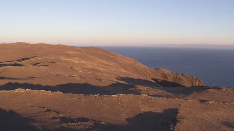 Flight over shadows of hills near Baikal lake Stock Footage 123710262