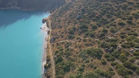 Flight over the shore of a high-mountain lake Stock Footage 139974363