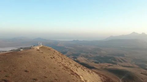 Flight over the slope of the mountain on which the pergola is located. Panorama Stock Footage 151140873