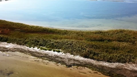 Flight over small islands on the sea Stock Footage 127237043