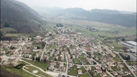 Flight over small town Cison di Valmarino in Italy in March Stock Footage 113825891