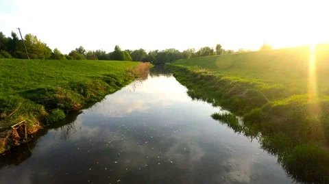 Flight over a small water channel Stockbeeldmateriaal 89449201