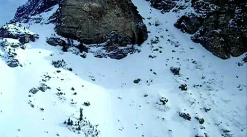 Flight over snow covered mountians Stock Footage 17129384