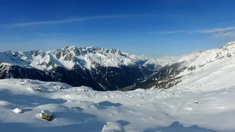 Flight over snowy mountain on to Chamonix Stock Footage 108639426