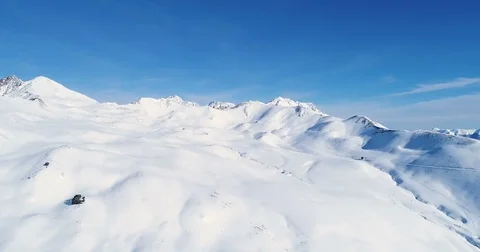 Flight Over Snowy Mountain Range With A Drone Stock-Footage 83280255